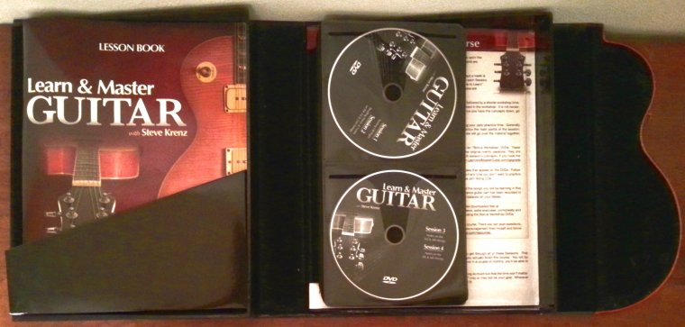 Open box of Learn & Master guitar